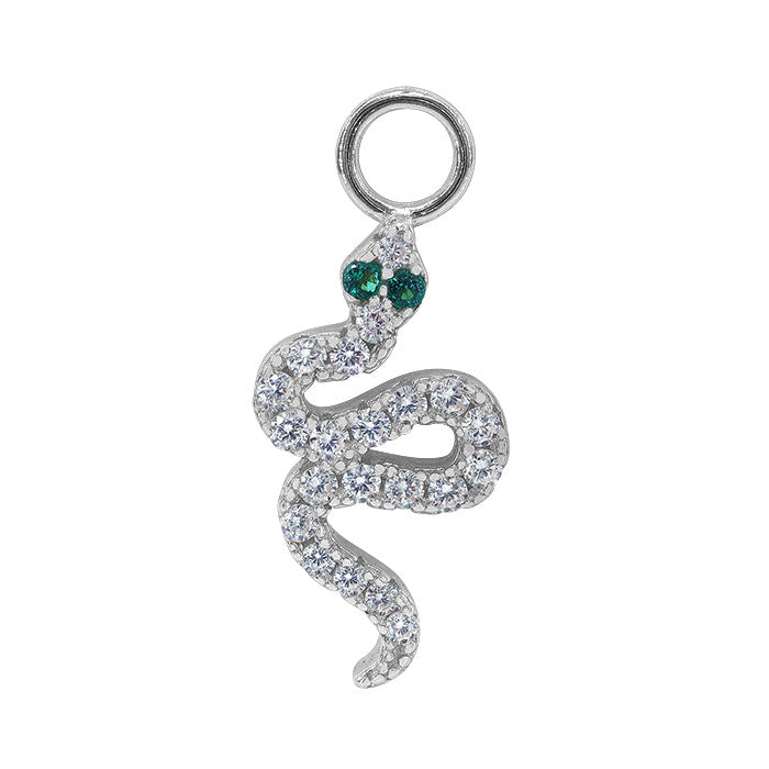 A sterling silver charm in the shape of a green-eyed snake with cubic zirconia stones.