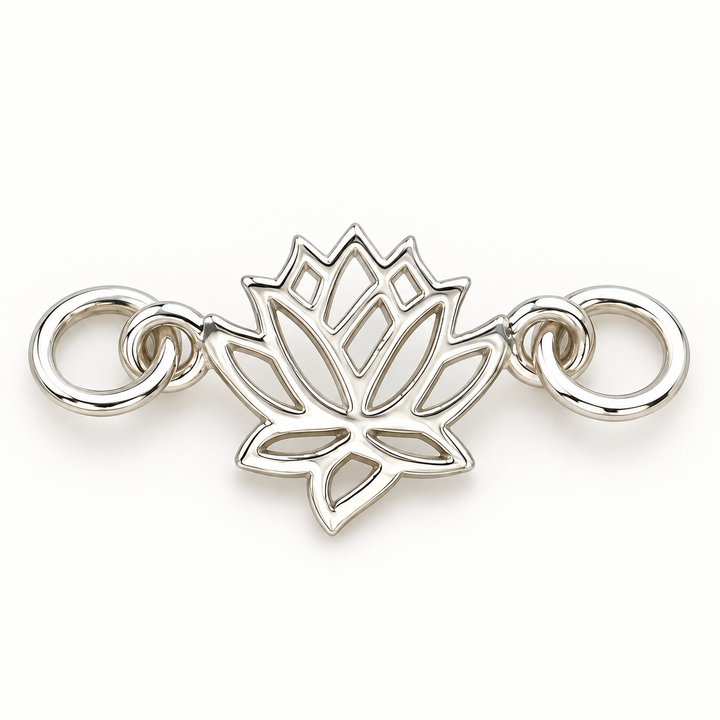Sterling silver openwork lotus connector charm with attachment rings on both sides, front view.