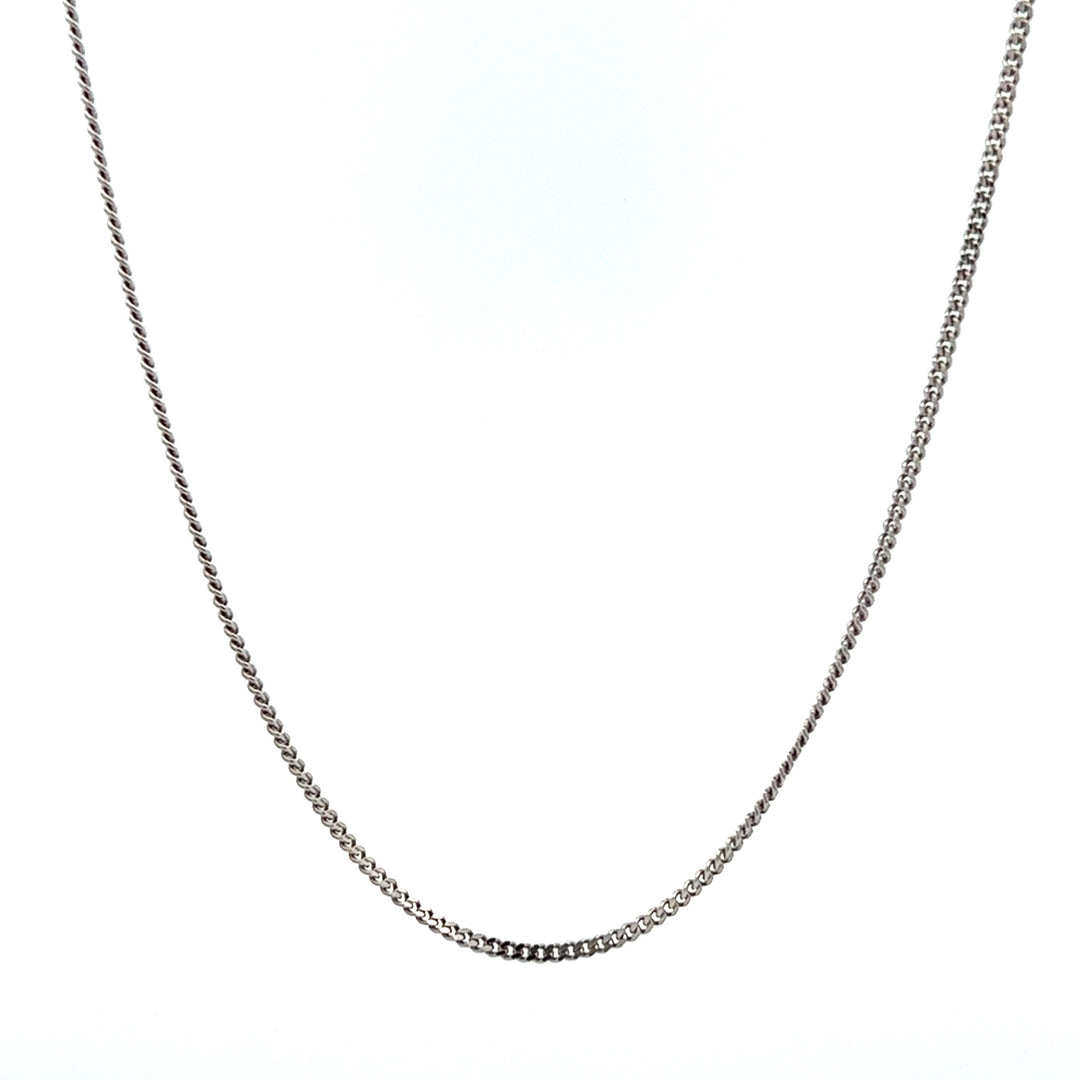 Fine 1.2mm rhodium plated diamond-cut curb chain necklace.