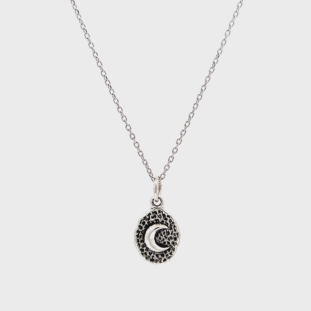 Antiqued Crescent Moon Oval Coin Charm