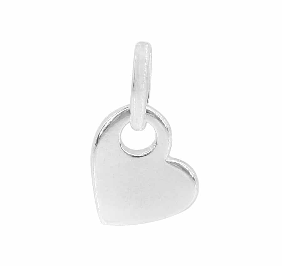 Sterling silver asymmetrical heart charm with a circular opening and jumpring bail.